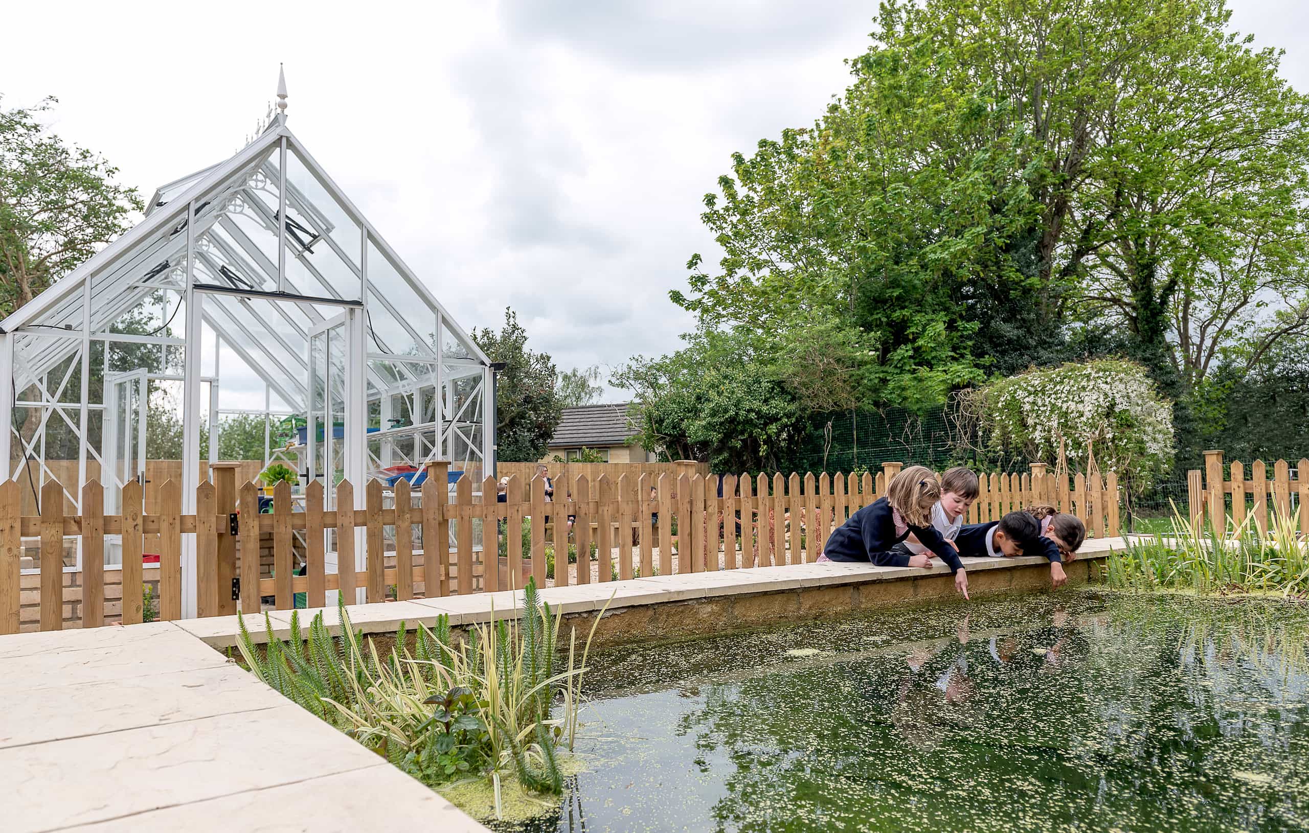 KES Bath pupils by pond in Teddy's Garden
