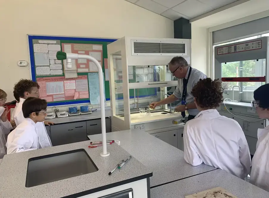 Science lesson with teacher as part of KES partnerships programme