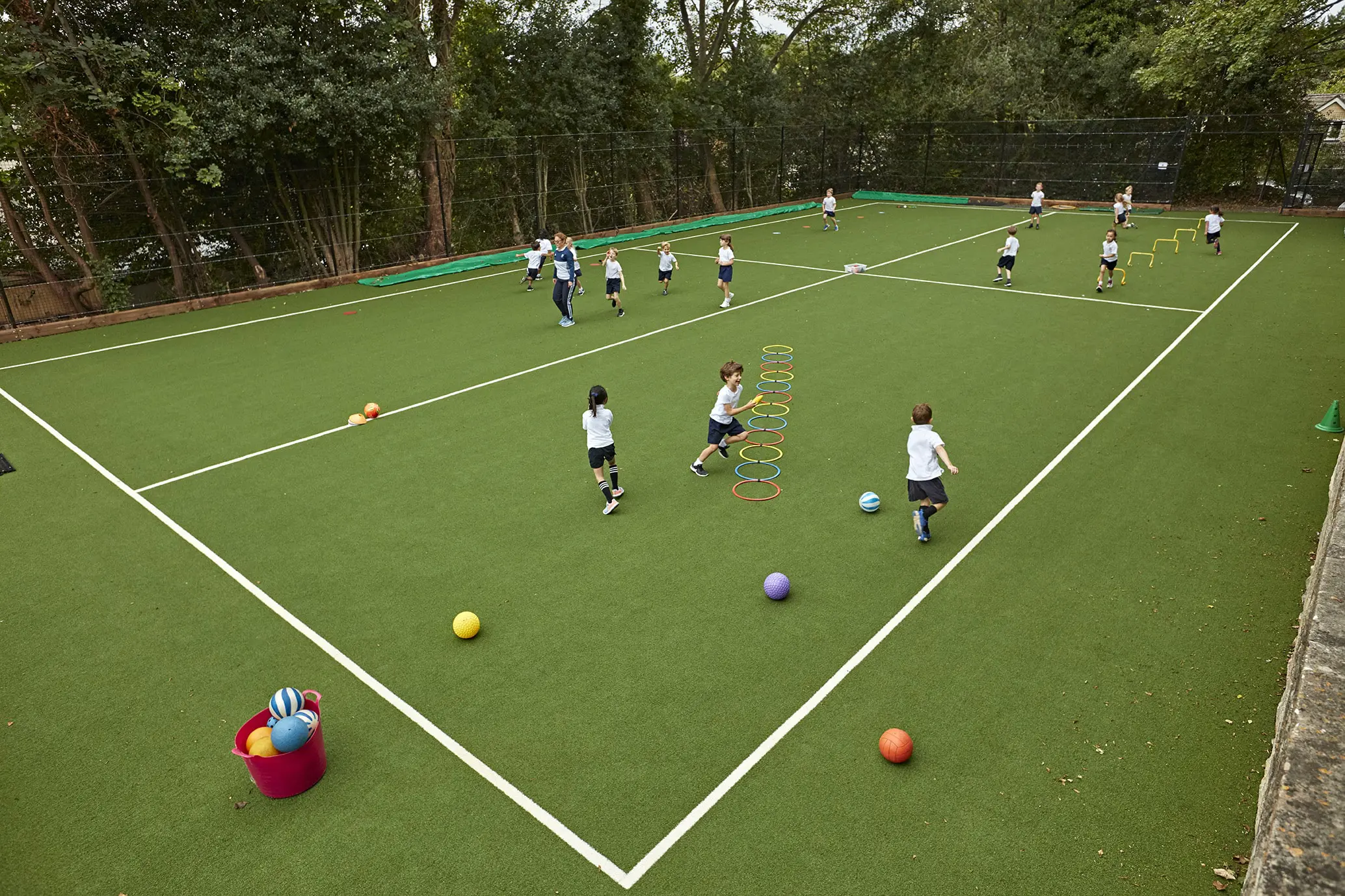 KES Bath pupils playing football outside on all weather pitch