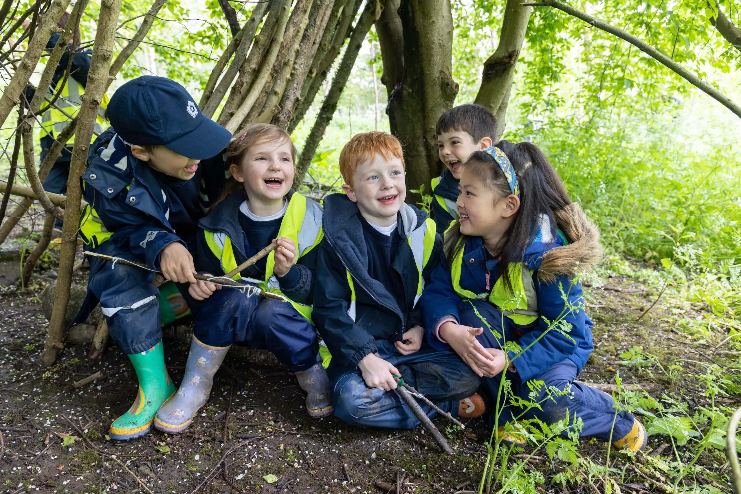 KES Bath pupils in forest under tree