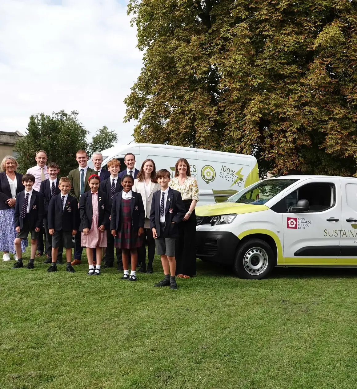 Pupils_and_staff_with_the_schools_electric_estate_vehicles
