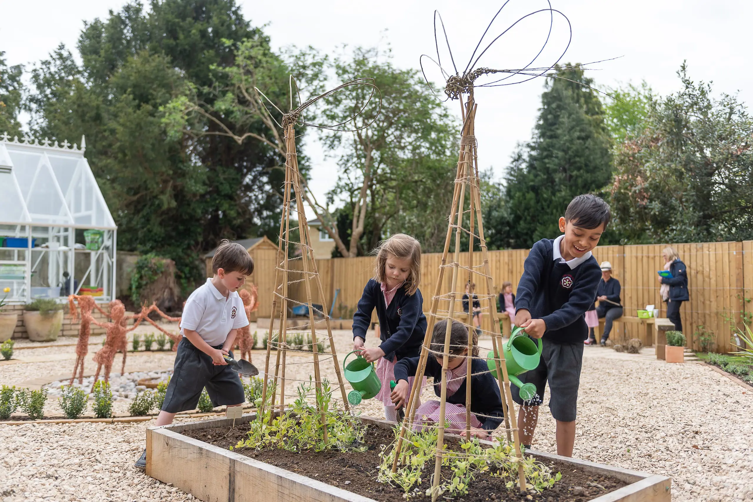 KES Bath pupils watering plans in garden