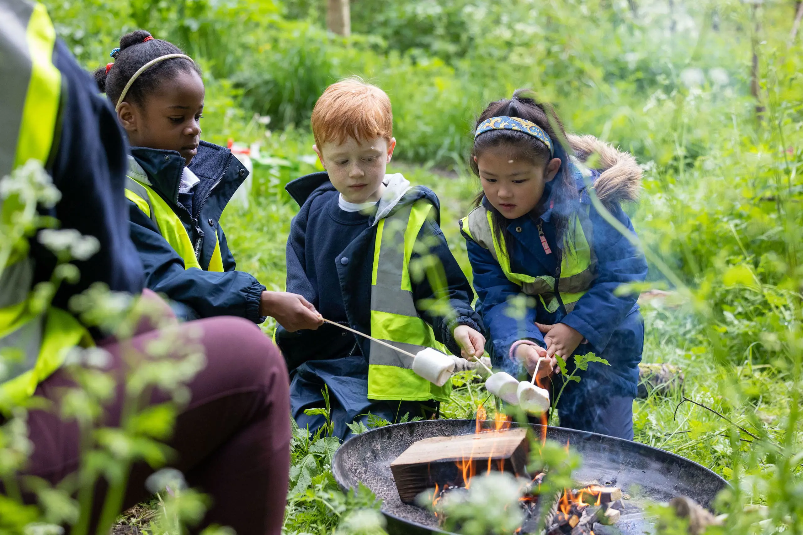 KES Bath pupils roasting marshmallows outside