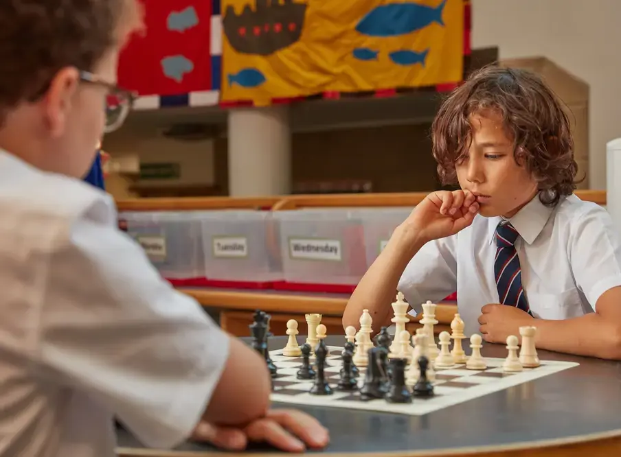 Pupils playing chess